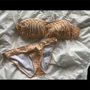 Small Peach-colored bandeau swimsuit from Target.